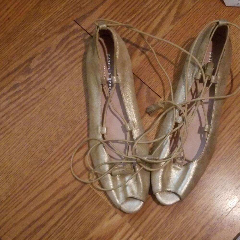 Gold peeptoe shoes
